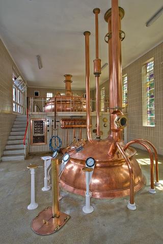 Color photograph of the inside of a small brewery.