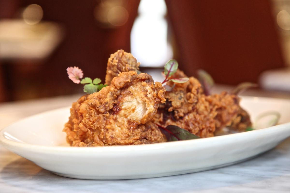 Photograph of prepared chicken on a plate.